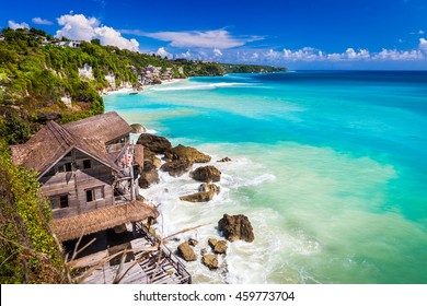 Azure beach with rocky mountains and clear water of Indian ocean at sunny day / A view of a cliff in Bali Indonesia / Bali, Indonesia - Powered by Shutterstock