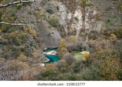 Azure River And Rural Old House