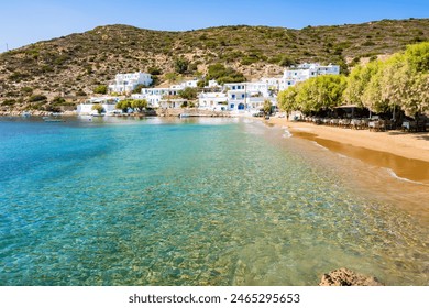 Azure sea and sandy beach in Platis Gialos village, Sifnos island, Greece - Powered by Shutterstock