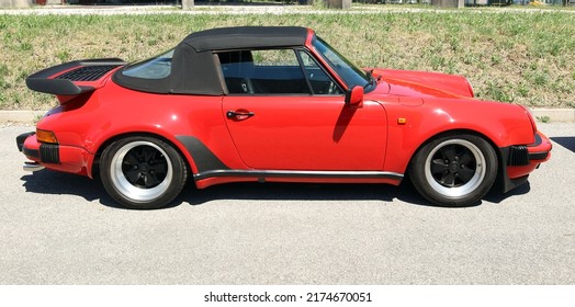 Azzida, Italy. July 2, 2022. Red Porsche 911 Carrera 3.2 Of The Eighties , During A Vintage Car Gathering .