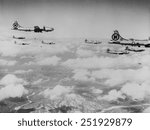 B-29s formation is shown dropping bombs over enemy territory in Korea. At first North Korea