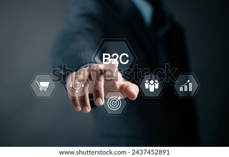 B2C, Business to customer marketing strategy concept. Business strategy, communication, feedback, online marketing and E-commerce marketing strategy. Businessman touch B2C icon on virtual screen.