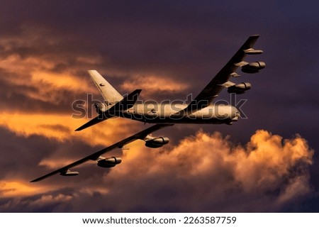 B-52  Bomber on a long range combat mission at sunset. Heavy eight engined Bomber. The Boeing B52 United States Air Force