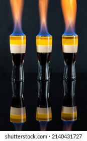 B-52 Cocktail Flambe (flamed) - Layered Shot Composed Of Coffee Liqueur, Irish Cream And Orange Liqueur