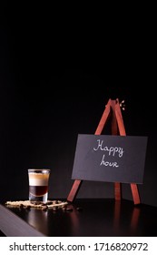 B-52 Layered Cocktail Shot On A Burlap Coaster Decorated With Fresh Roasted Coffee Beans Placed On A Bar Counter With Copy Space; B 52 Cocktail Happy Hour