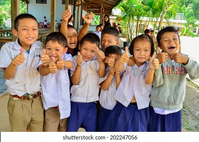 BAAN MAE- OR , MAE CHAEM, CHIANGMAI, THAILAND, JUNE 10 : Unidentified Karen Ethnic Kids Are Showing Thumbs Up Sign At Their Primary School  On June 10,2014 Mae Chaem,Chiangmai,Thailand  