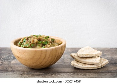 Baba Ganoush In Bowl On Wooden Table

