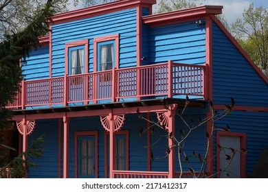                  Babelsberg Potsdam Germany - April 29 2022 Movie Studio Props For Film Set    Red And Blue House For Western Movie            