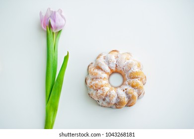 Babka - Lemon Easter Cake And Tulips On A White Table