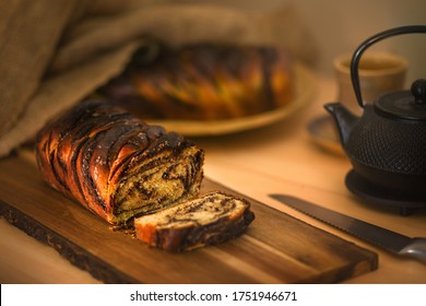 Babka, traditional jewish bread-like cake swirled with chocolate or cinnamon and often topped with nuggets of cinnamon-sugar streusel, popular mainly in America, where it was brought by immigrants.