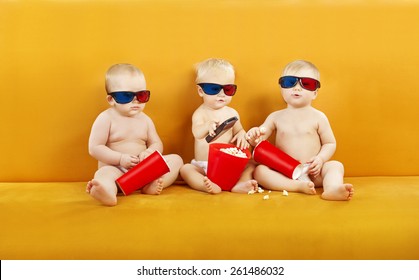 Baby 3D Glasses Watching Film On TV, Children Eating Popcorn And Watch Cinema Movie In Home Theater, Kids In Diapers With Remote Control