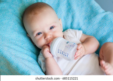 Baby 6 Months And He Drinks Water From A Bottle