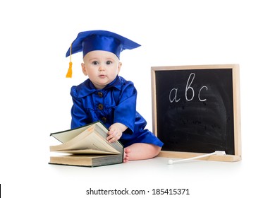 Baby in academician clothes  with book and chalkboard