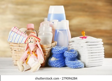 Baby Accessories On Table On Grey Background