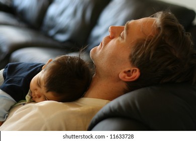 baby sleeping on dads chest