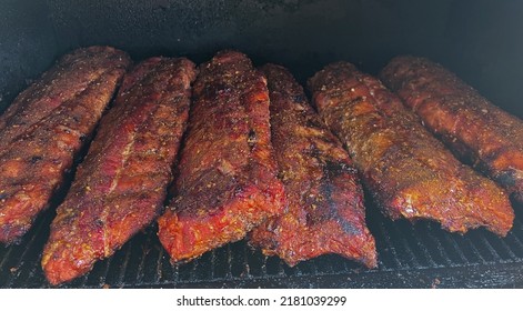 Baby Back Rips on a smoker - Shutterstock ID 2181039299