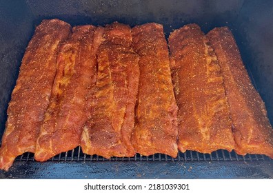 Baby Back Rips on a smoker - Shutterstock ID 2181039301