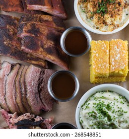 Baby Backs, Spare Ribs, Brisket, Pork Shoulder, Mac + Cheese, Cornbread,
 Cole Slaw And Mashed Potatoes 