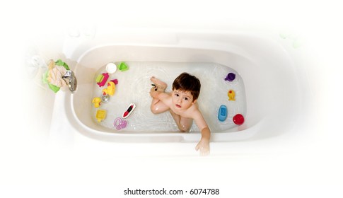 Baby In Bathtub Shot From Above Over White