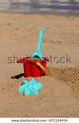 Similar – Shovel and starfish on the beach