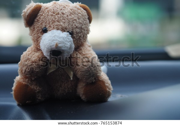 The baby
bear in the car that making feel alone.
