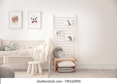 Baby bedroom decorated and pictures animals