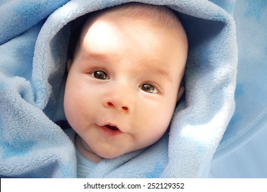 Baby In Blue Blanket