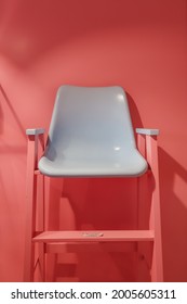 Baby Blue High Chair On Pink Background Wes Anderson