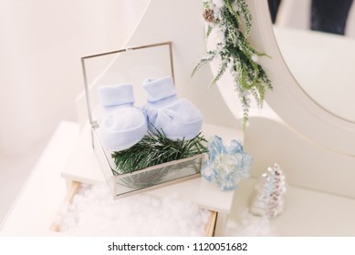 Baby Booties On The Casket