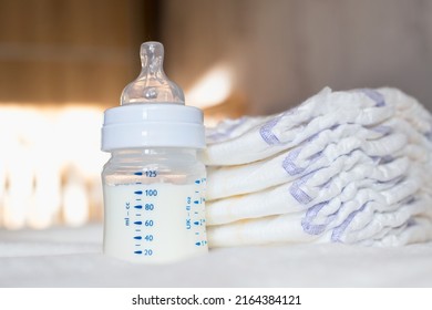 Baby Bottle Milk Diapers On White Stock Photo 2164384121 | Shutterstock