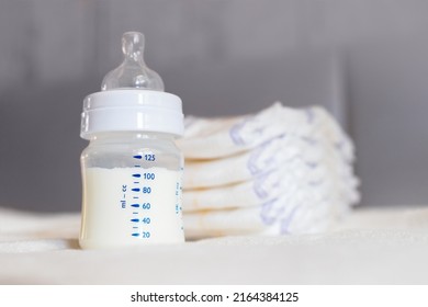 Baby Bottle Milk Diapers On White Stock Photo 2164384125 | Shutterstock