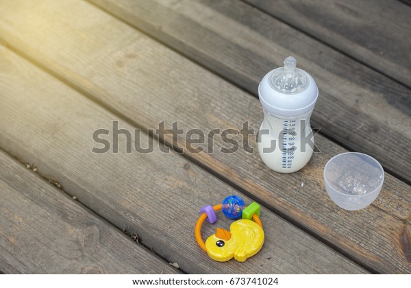 wooden baby bottle toy