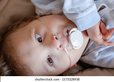 via nasal cannula