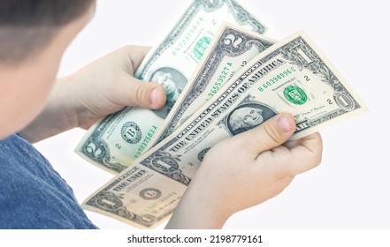 Baby Boy Counting Some Dollar Bills Isolated On White Light Background.top View Over Shoulder From Back.money Saving Financial Education Kids Family.one Two Dollars Banknote In Child Hands Isolated 