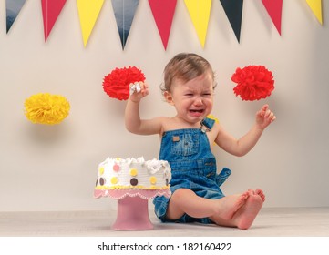 Baby Boy Crying While Eating His  Birthday Party Cake. Smash The Cake Party