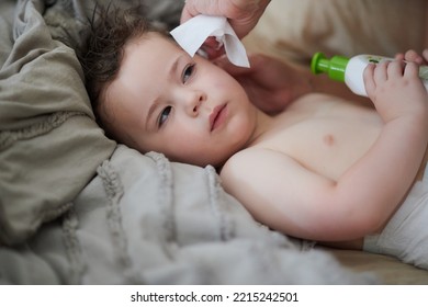 Baby Boy In Diapers After A Bath And Getting Dressed