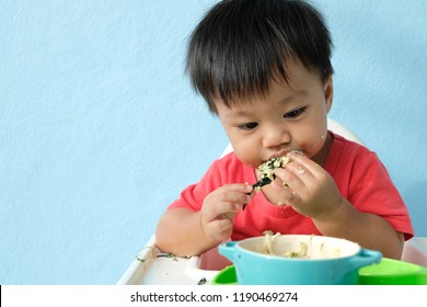 Baby Boy Eat By Himself As Baby-led Weaning 