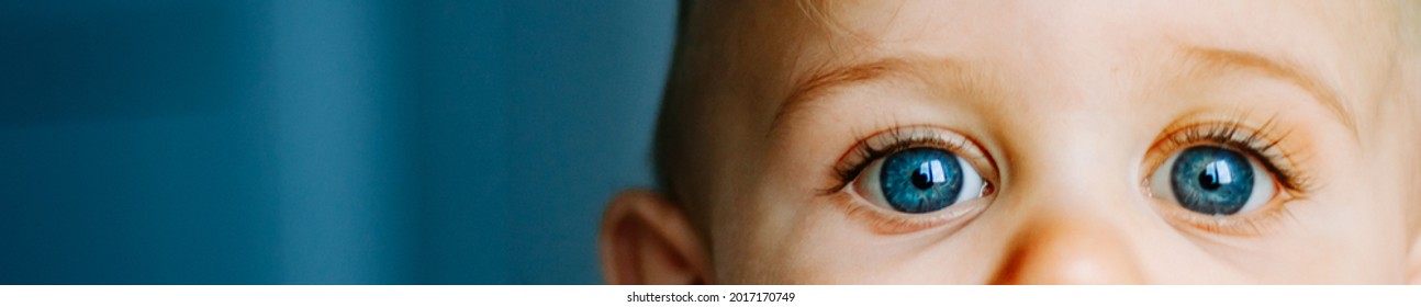 Baby boy face with blue eyes, close-up. - Powered by Shutterstock