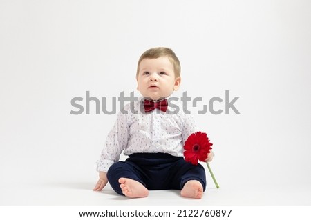 Baby Boy Flower, Kid Well Dressed in Suit, One Year Child with flower sitting over White, Children Fashion Clothing gentelmen