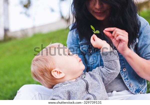 Baby Boy Gives His Young Mother Stock Photo Edit Now 329739131