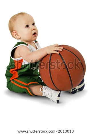 Baby boy holding basket ball. Clipping path.  Over white. Full body.