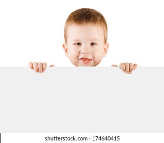 Baby boy holding white blank board isolated on white background