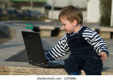 Baby Boy With Laptop Outside