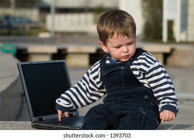 Baby Boy With Laptop Outside