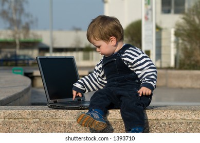 Baby Boy With Laptop Outside