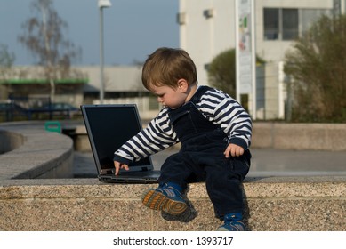 Baby Boy With Laptop Outside