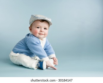 Baby Boy On Blue With Hat
