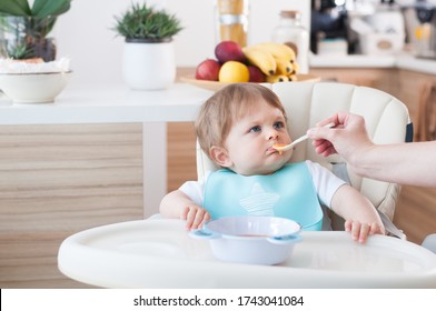 Baby boy refuses to eat puree.