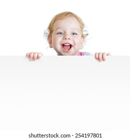 Baby boy showing blank placard with copy space isolated