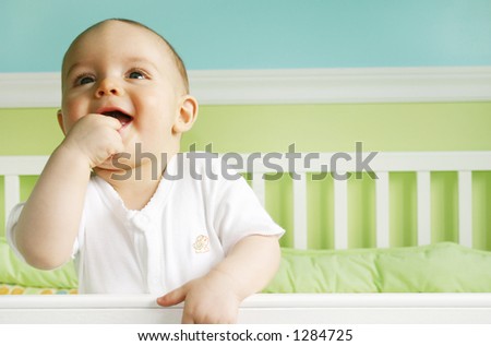 Baby Boy Smiling in crib